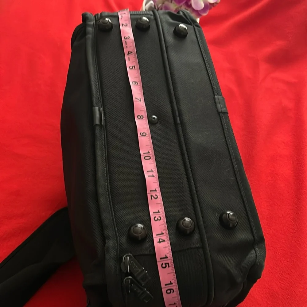 Tumi Black brief case/messenger bag